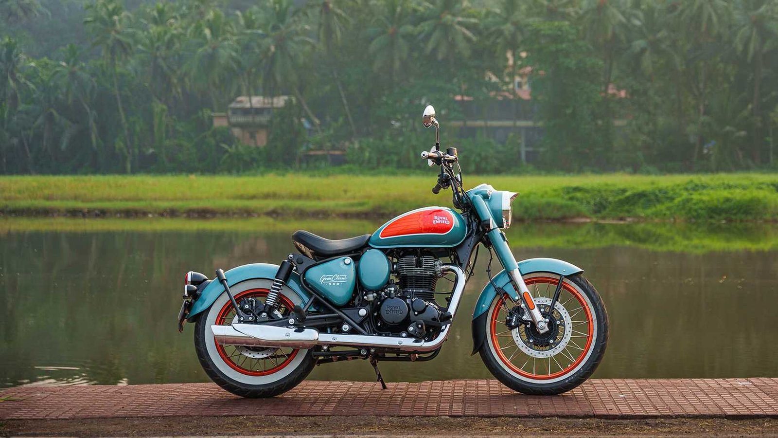 Beauty shot of the Royal Enfield Goan Classic 350 parked by a lake